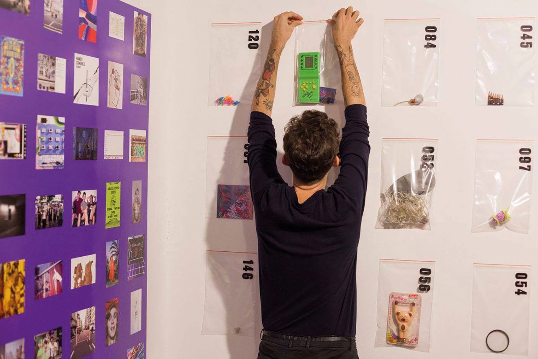 Artist installing artwork